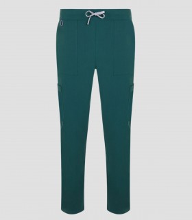 Pantalón sanitario unisex Atlas color Verde jungla con tejido stretch reciclado y ocho bolsillos funcionales