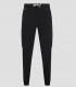 Pantalón sanitario tipo jogger unisex Avani color Negro en tejido stretch con diez bolsillos y puño elástico