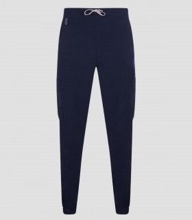 Pantalón sanitario tipo jogger unisex Avani color Azul noche en tejido stretch con diez bolsillos y puño elástico